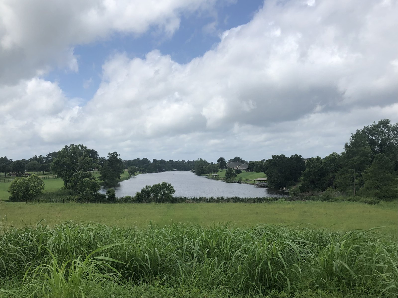 Cane River Lake near Natchitoches, looking south from a dam over open fields