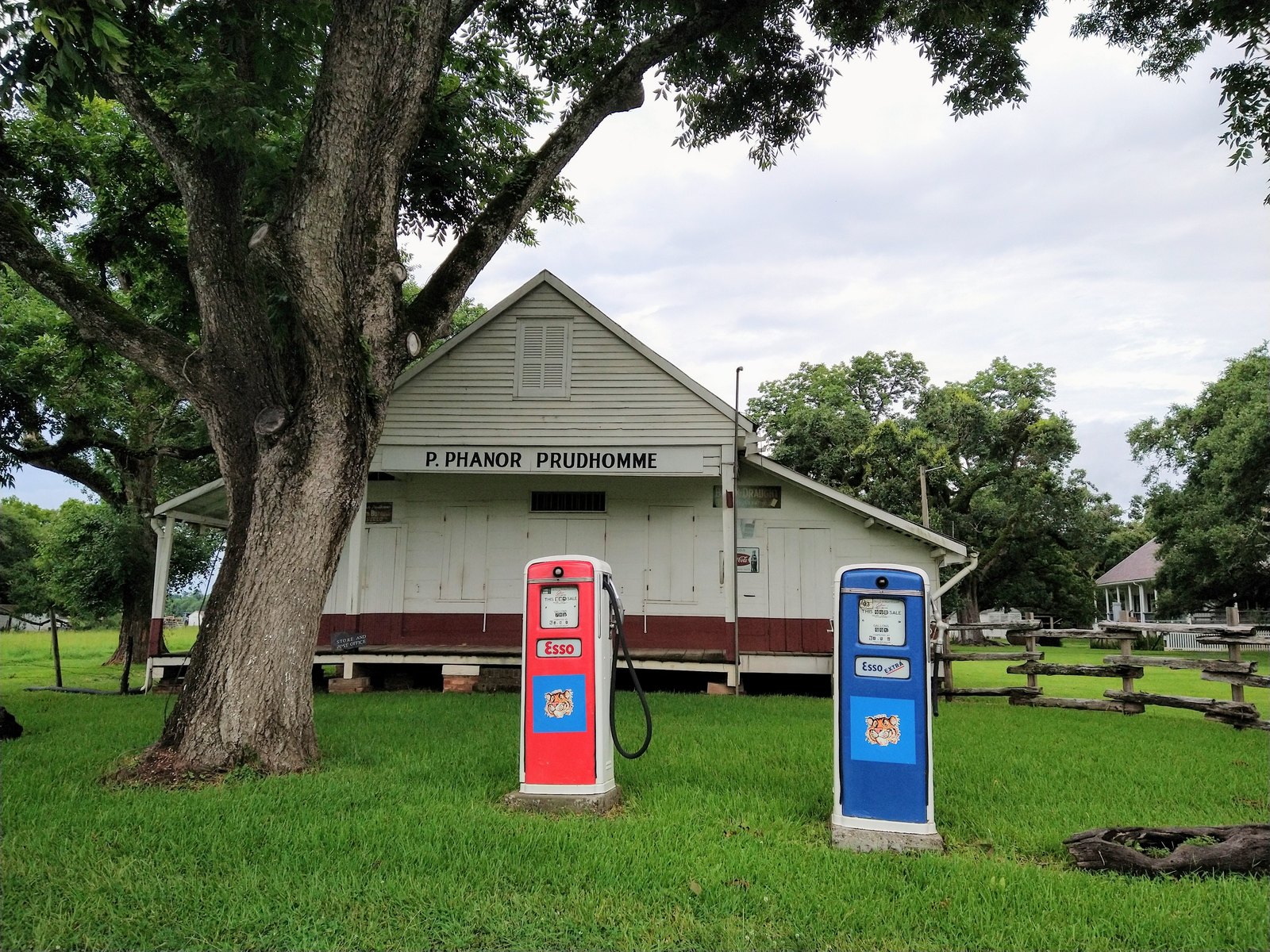 Two old Esso gas pumps in front of the plantation store at Oakland Plantation, Cane River Creole National Historical Park